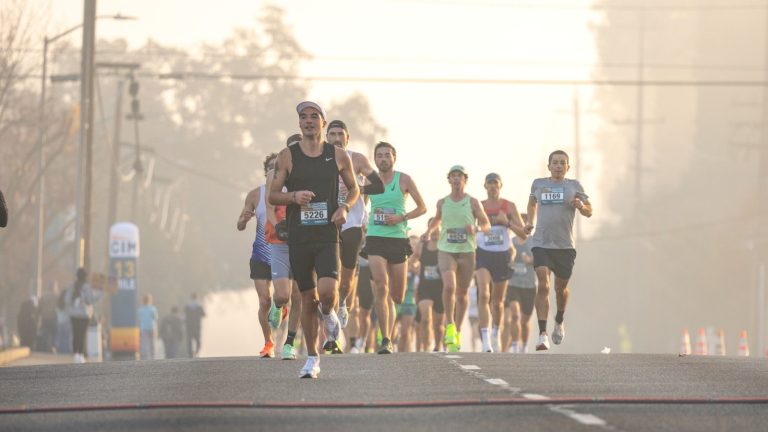 Marathon runners with one out in front, like a competitor ranking higher on Google